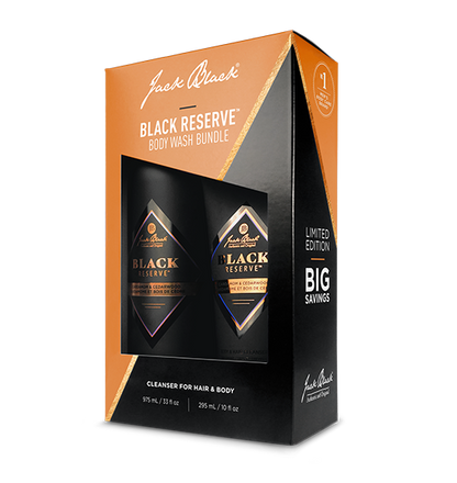   Black Reserve body wash set bottles in front of black reserve body wash bundle box and packaging